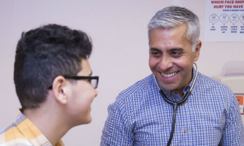 Photo of Dr/ Chulani and patient